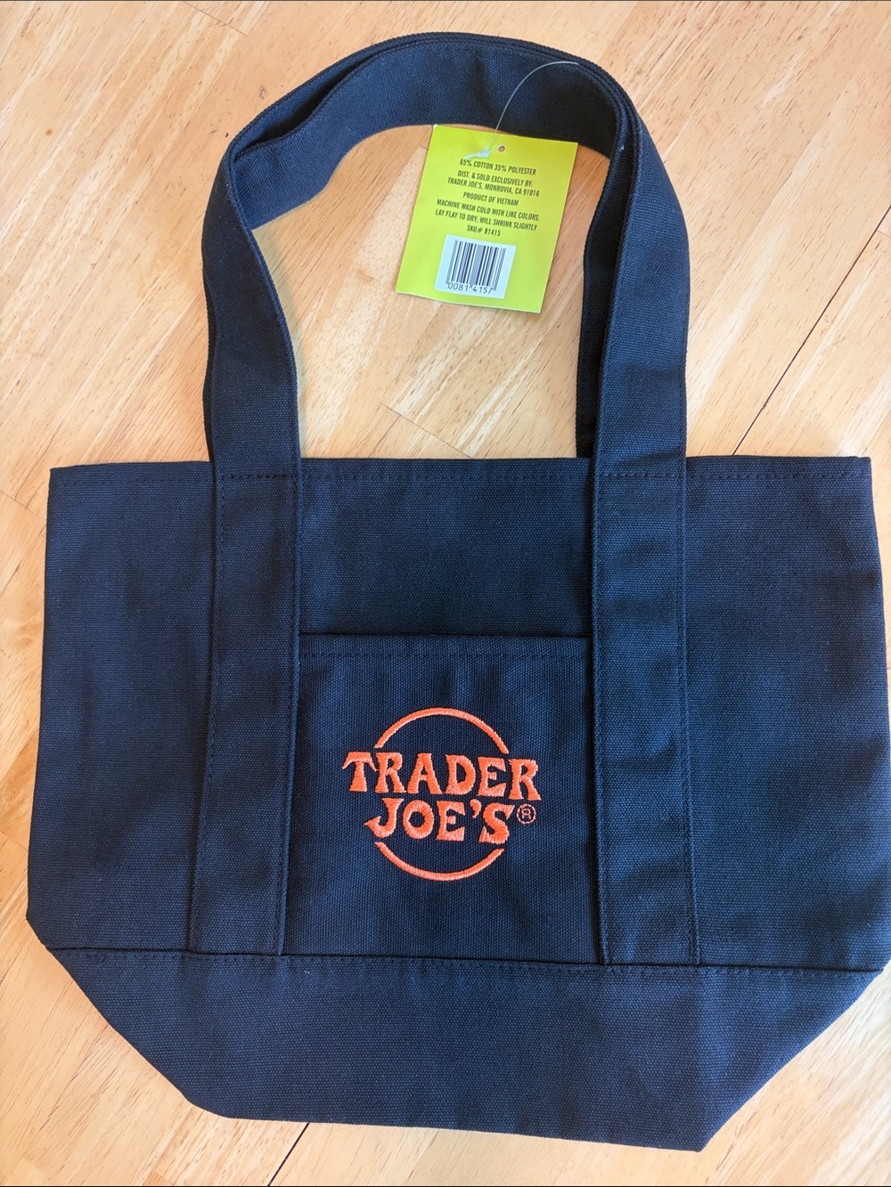 NWT Trader Joe’s Trick or Treat Black Canvas Tote Bag with Orange Logo - Picture 2 of 3